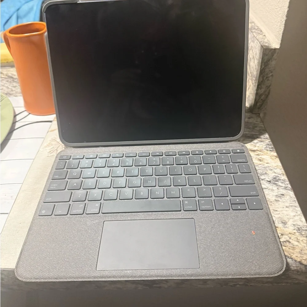 Apple Tablet with Gray Keyboard Case